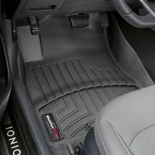 WeatherTech 08-13 Toyota Highlander Front FloorLiner - Black - Installation View