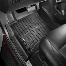 WeatherTech 08+ Nissan Armada Front FloorLiner - Black - Installation View