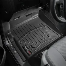 WeatherTech 09-14 Ford F-150 Front FloorLiner - Black - Installation View