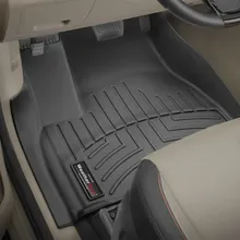 WeatherTech 2015 Kia Sedona Front FloorLiner - Black - Installation View